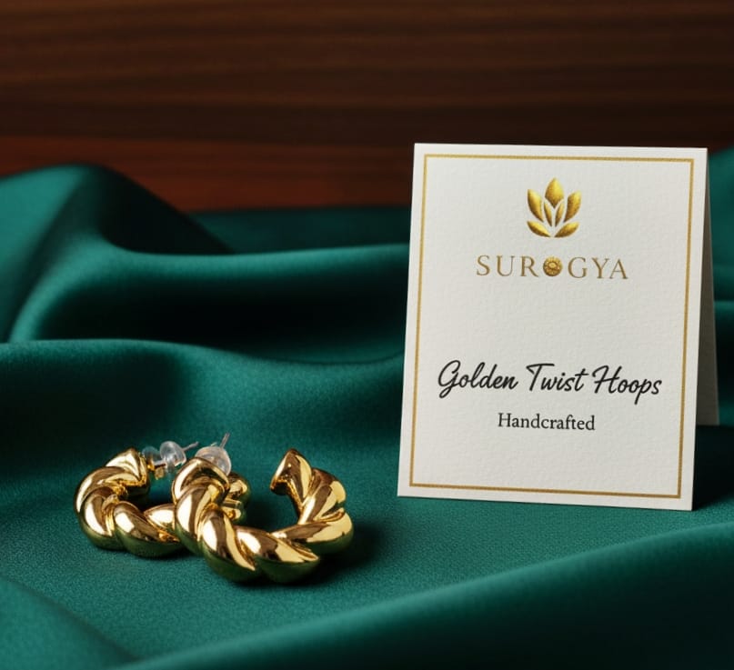 Golden Twist Hoops - Handcrafted Statement Earrings by SUROGYA