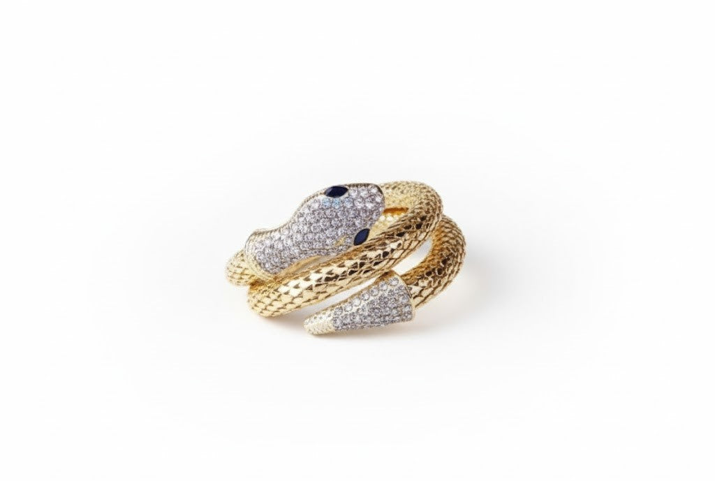 Yellow Gold Snake Wrap Bracelet with Diamond Pavé and Sapphire Eyes by Surogya