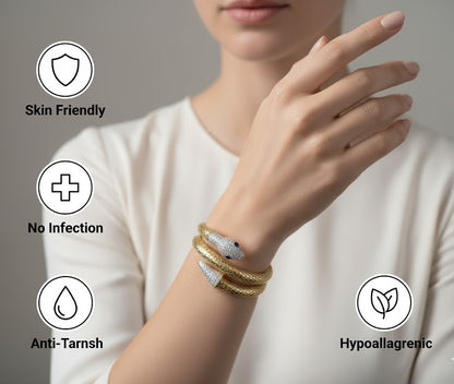 Yellow Gold Snake Wrap Bracelet with Diamond Pavé and Sapphire Eyes by Surogya