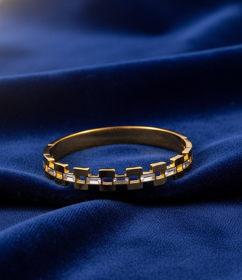 Women's Link Style Gold Bangle with Baguette Cut CZ Stones by Surogya