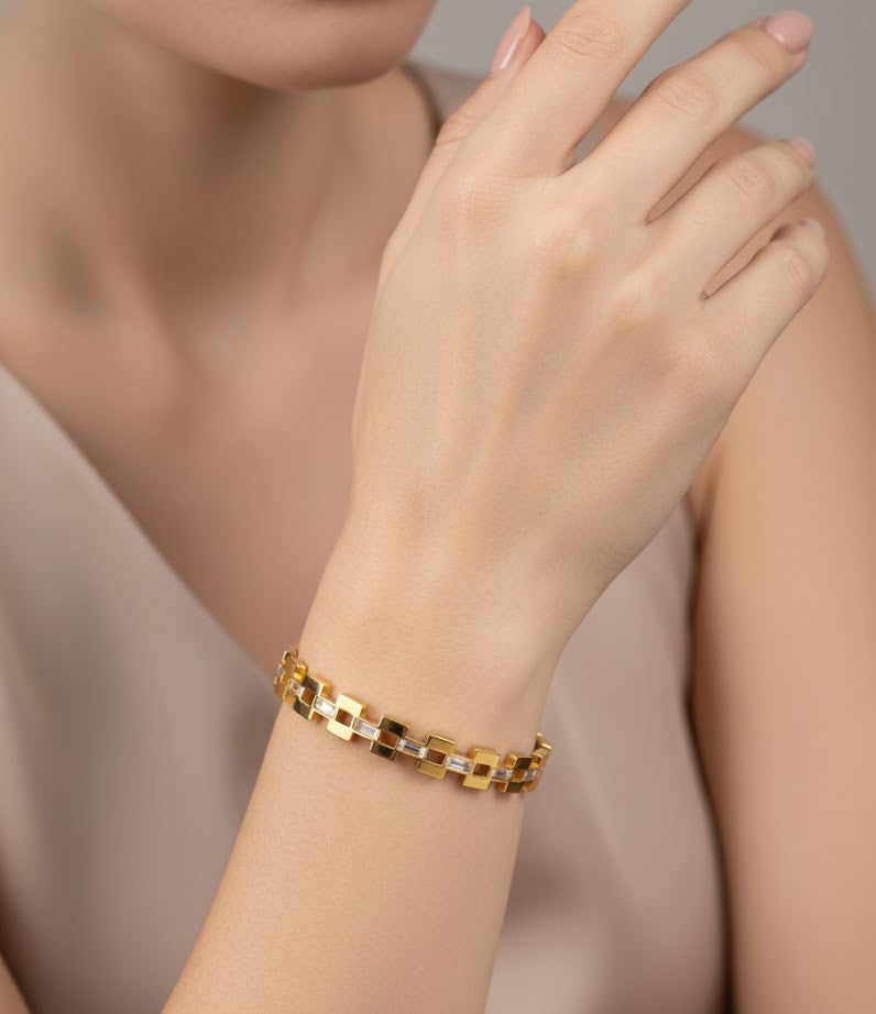 Women's Link Style Gold Bangle with Baguette Cut CZ Stones by Surogya