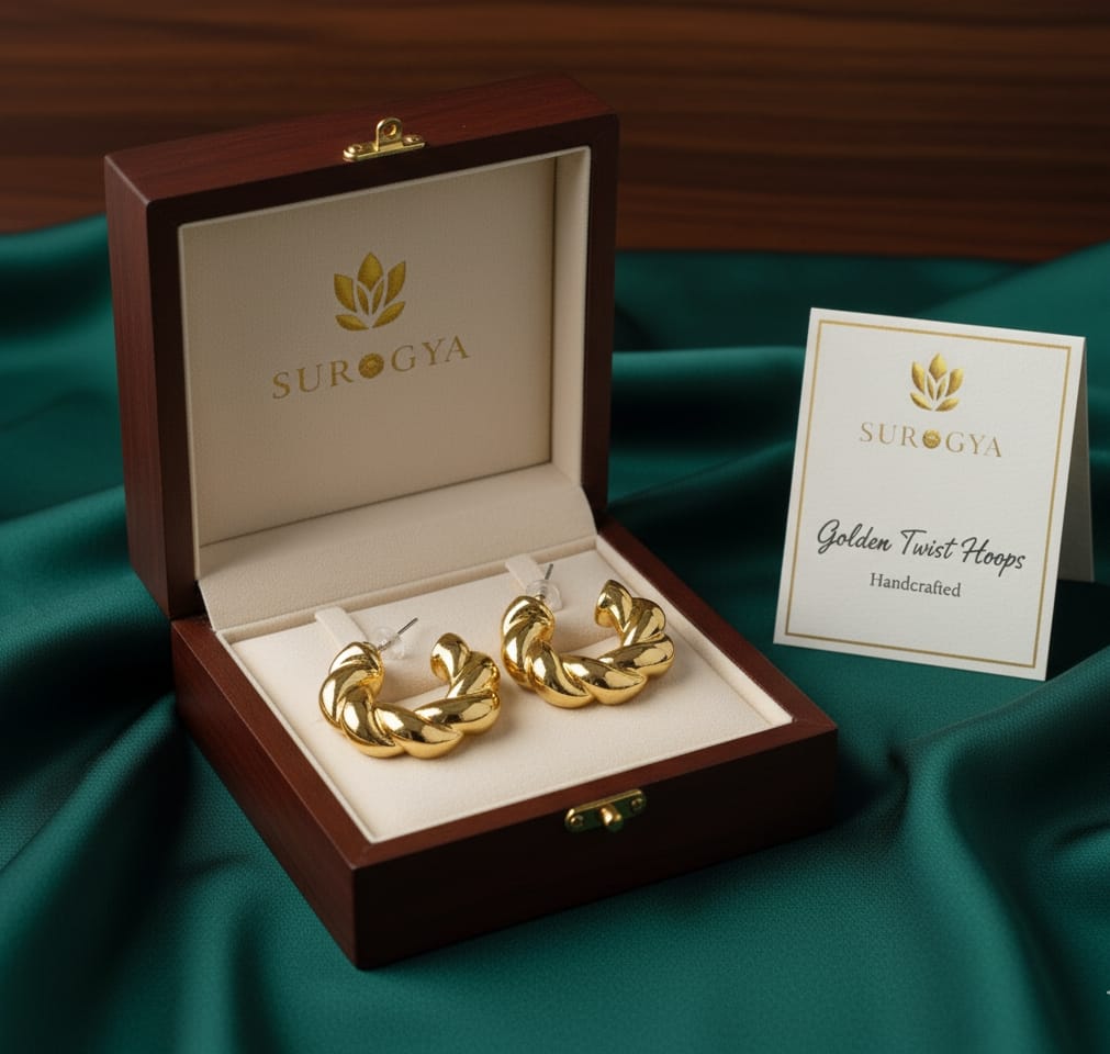Golden Twist Hoops - Handcrafted Statement Earrings by SUROGYA