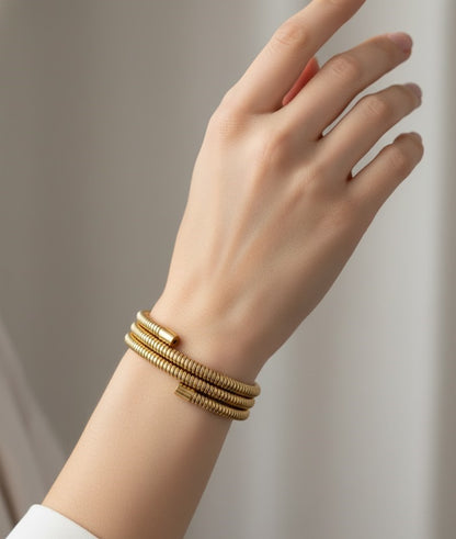 Surogya special Chunky Gold-Tone Coil Wrap Bracelet | Modern Spiral Statement Bangle