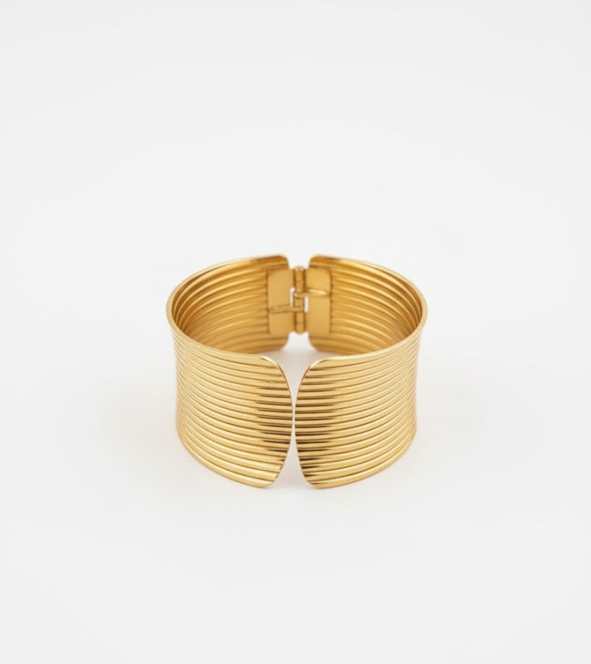 Surogya Bold Statement: Chunky Gold Ribbed Hinged Cuff Bracele