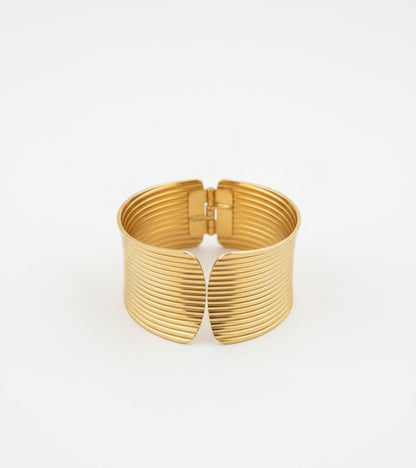 Surogya Bold Statement: Chunky Gold Ribbed Hinged Cuff Bracele